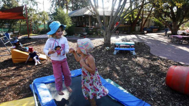 Children at play at the  Lady Forster Kindergarten in Port Melbourne, which the City of Port Phillip wants to demolish and incorporate into an "early childhood hub".