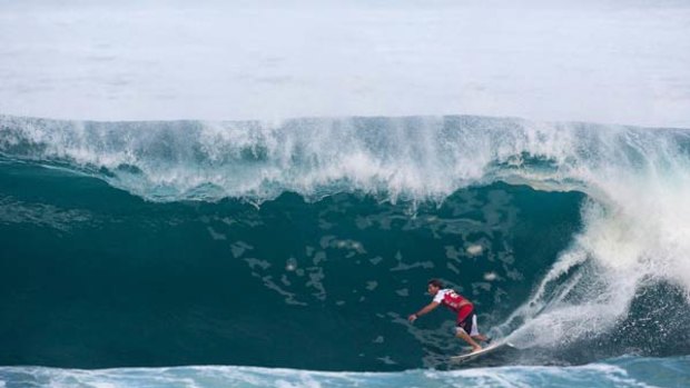 Danger man ... Andy Irons suffered an interference call but still won his first-round heat from Marcus Hickman at the Pipeline Masters on Thursday. The three-time world champion is  out to throw a spanner in the world title race.