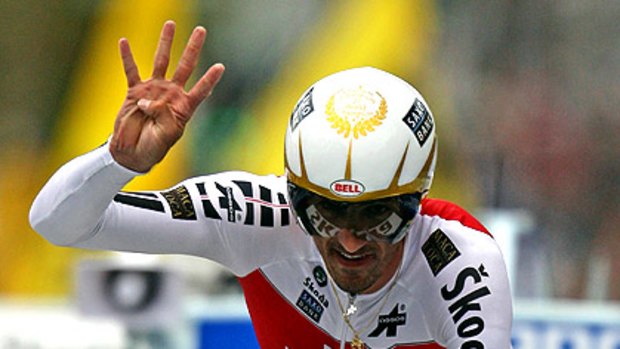 Fabian Cancellara celebrates his fourth world time-trial title at Geelong yesterday.