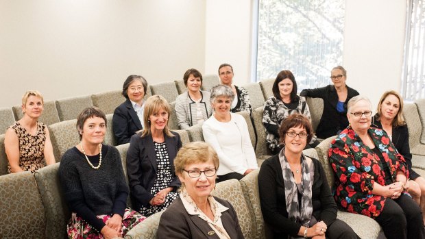 Victorian Civil and Administrative Tribunal female members pose for a portrait on Monday in Melbourne.  Under new rules being introduced by the Victorian State Government, judiciary appointments must be at least 50 per cent women. 