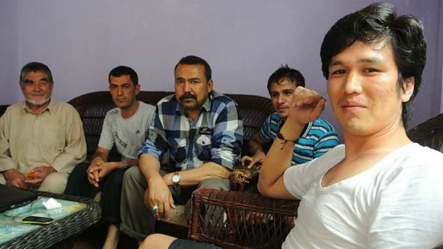 Mohamad Jawed (right) with fellow Afghan asylum seekers in Cisarua, Indonesia.