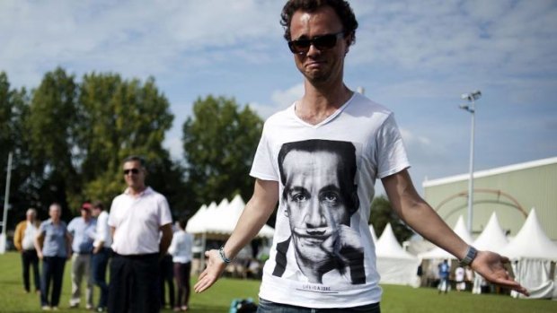Silent statement: A UMP supporter wears a shirt featuring former president Nicolas Sarkozy.