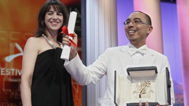 Surreal moment...Apichatpong Weerasethakul collects the 2010 Palm d'Or.