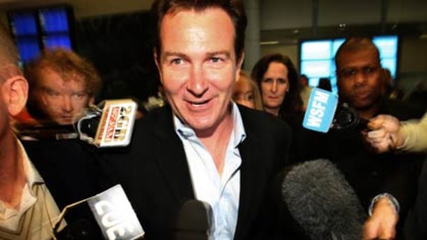 Mark McInnes faces the media on his return to Sydney
