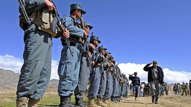 The line of duty &#8230; Afghan uniformed police welcome local government officials.