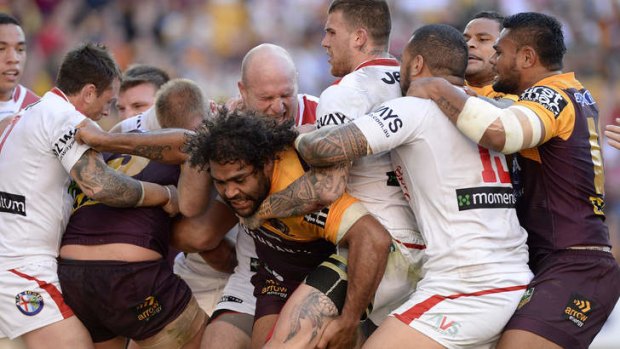 Tense affair: A brawl erupts during between the Brisbane Broncos and the St George Illawarra Dragons at Suncorp Stadium.