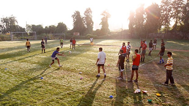 The Delhi Hurricanes rugby team, from which two brothers were selected for India's sevens squad, train.