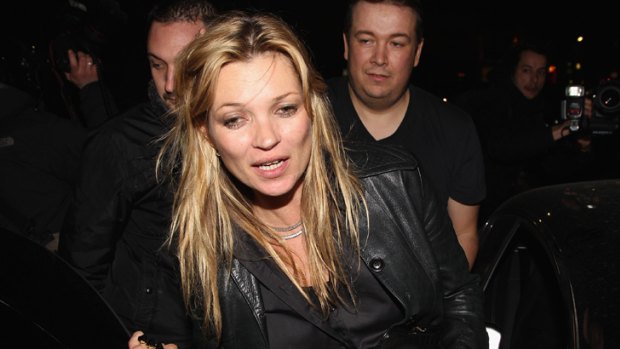 Cigarettes and champagne diet ... Kate Moss parties in Paris earlier this year.