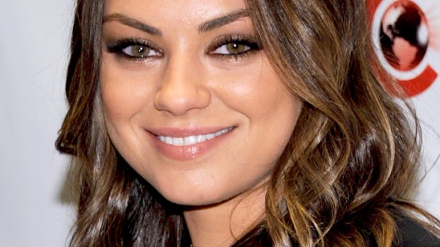 Wining and dining ... Mila Kunis admits to a healthy appetite.