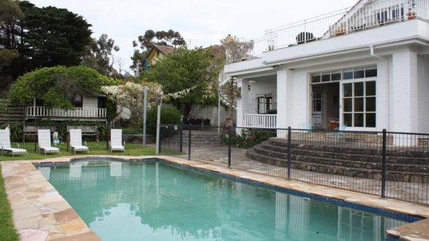 The pool did it: Palmers Hill helps set an easy routine of swim, sunbake, eat and nap.