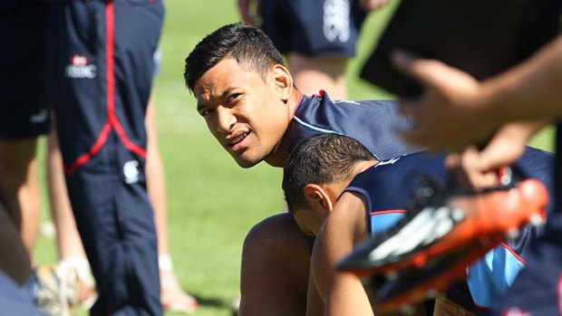 Looking up ... Israel Folau in his first training session at Moore Park since joining the Waratahs following his stint with AFL new boys Western Sydney.