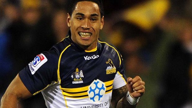 Sprinting away ... Former NRL star Joe Tomane scored two tries for the Brumbies.