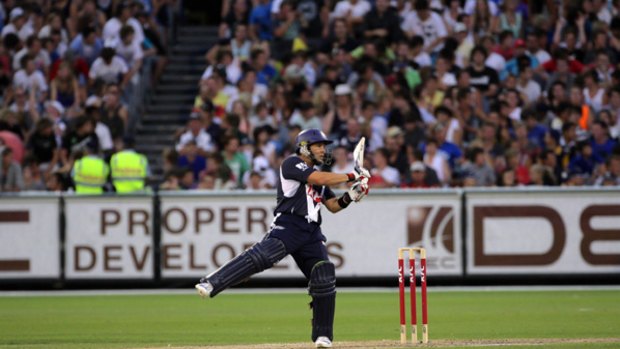 Little ma, big shot, big crowd. Brad Hodge during his 56-ball innings of 90 for Victoria against Tasmania in the Big Bash, in front of a record domestic crowd of 43,125 at the MCG.