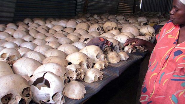 Intentional killings ... a Rwandan caretaker examines a display of some 5,000 ethnic Tutsis massacred in the Ntarama Church compound.
