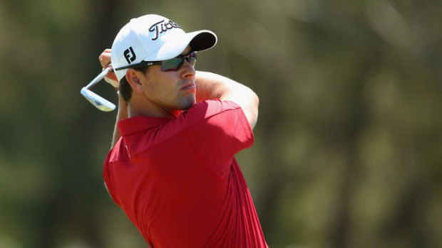 Long view: Adam Scott, two shots behind Rickie Fowler, is in great form with the driver.