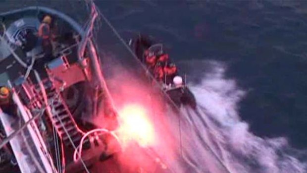 Anti-whaling activists attack a Japanese harpoon ship with incendiary devices.