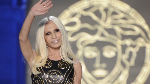 In fashion ... Donatella Versace takes a bow on the Milan catwalk.
