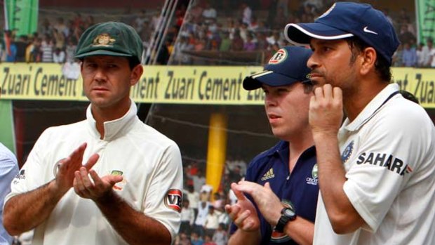 Captain knocked ... Ricky Ponting applauds Indian maestro Sachin Tendulkar, who won the man of the series award after a double century in Bangalore. Australia's series loss has renewed debate about Ponting's leadership.