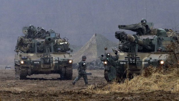 South Korean soldiers carry out a military exercise near the border with North Korea on Tuesday.