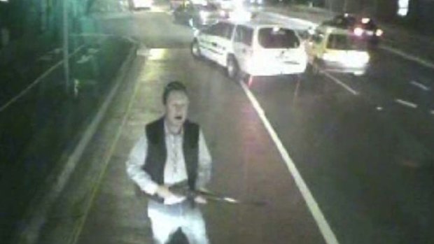 CCTV footage of Peter Brophy wielding a rifle in Rozelle.
