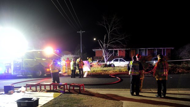 ACT Emergency Services investigate a house fire on Neumayer Street in Page.
