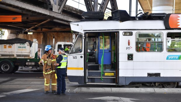 Trams on Racecourse Road are being diverted after the truck collided with the bridge.