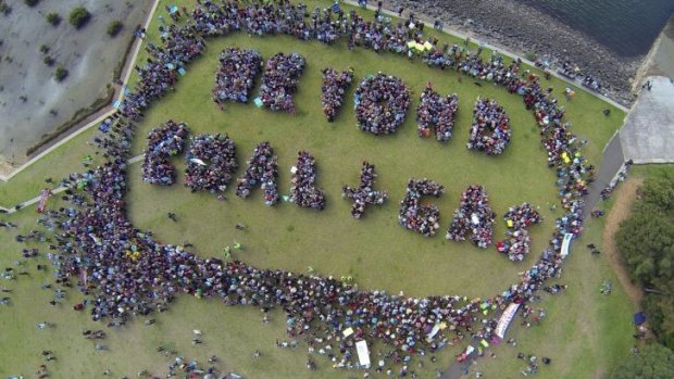 Thought bubbles: Protesters at Glebe's Bicentennial Park made their feelings clear as fossil fuel emissions hit a record high. Protests were organised in 150 countries ahead of a UN climate change summit in New York.
