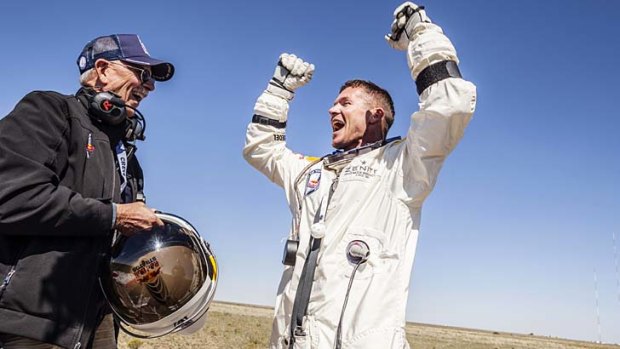 Successful jump ... Felix Baumgartner celebrates.