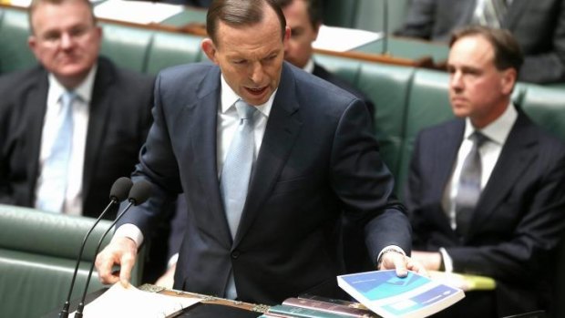 Prime Minister Tony Abbott tables in Parliament the royal commission's report on the Rudd government's home insulation scheme.