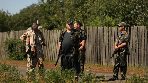 Pro-Russian rebels in the village of Rassypnoye.