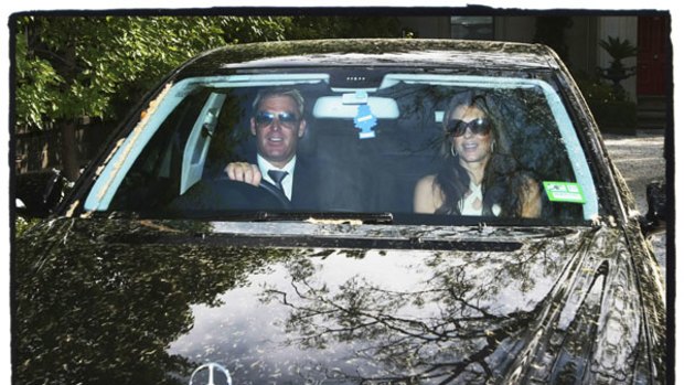 Shane Warne and Elizabeth Hurley leave his Brighton home.