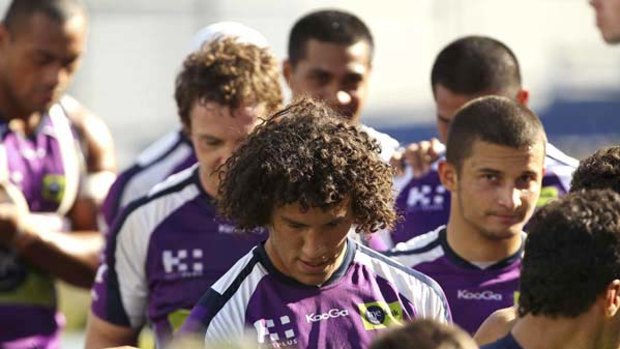 Storm players head to the change room at the completion of training session on Thursday.