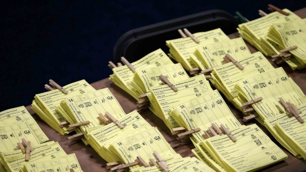 Tallied ballots tagged together as polls close in Britain's general election on Thursday. 