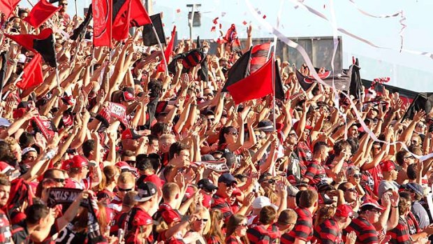 Wanderers fans cheer on their team in Gosford.