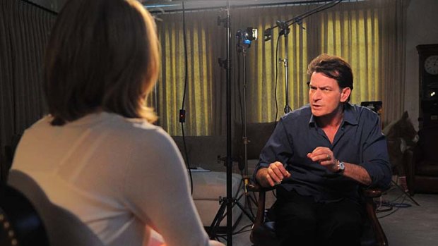 On the offensive: actor Charlie Sheen (R) talks to ABC News' Andrea Canning