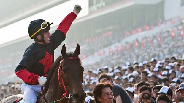 Top of the world: Olivier Doleuze and Good Ba Ba in winning form in Hong Kong.