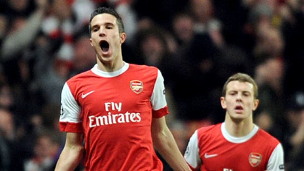 Arsenal striker Robin Van Persie celebrates his 78th minute goal.