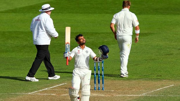 Ajinkya Rahane marks his century on day two of the second Test match against New Zealand in Wellington.