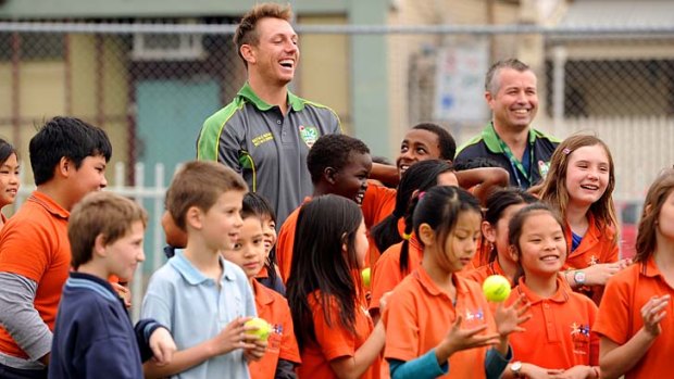 Cricket education: James Pattinson joins the kids at Richmond West Primary School.