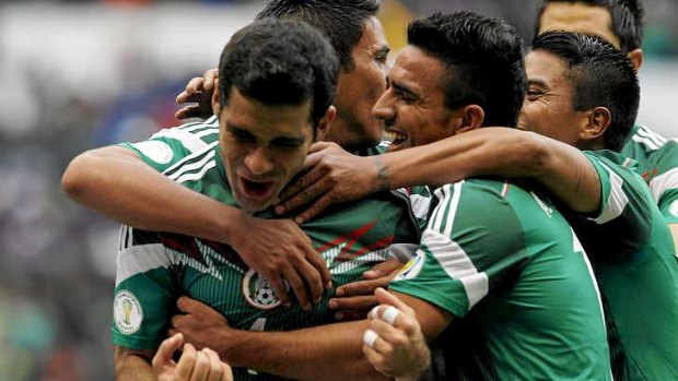 For Barcelona player Rafael Marquez celebrates after scoring against New Zealand.
