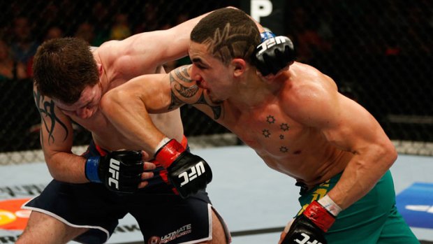 The Ultimate Fighter: The Smashes welterweight winner, Robert Whittaker (pictured landing an elbow to the jaw of the UK's Brad Scott) fights The Ultimate Fighter 16 winner Colton Smith at UFC 160 this weekend.