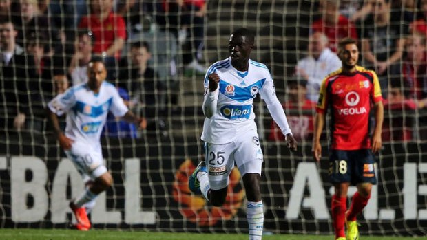 Chance to shine: Victory's Jason Geria, celebrating against Adelaide United, will play at right-back against the Mariners.