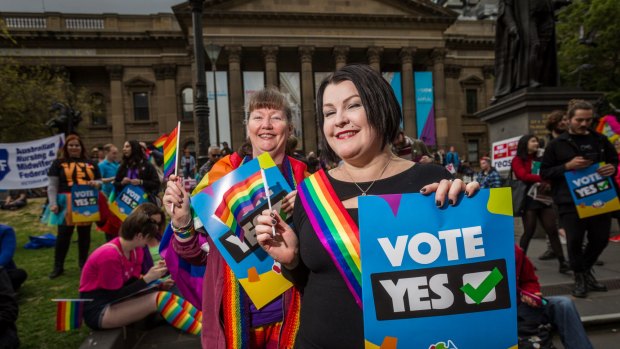 People rally in support of same-sex marriage in Melbourne.