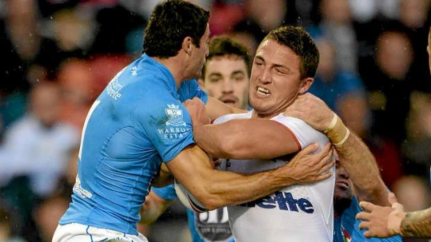 Anthony Minichiello takes on Sam Burgess in the World Cup warm-up match between England and Italy.