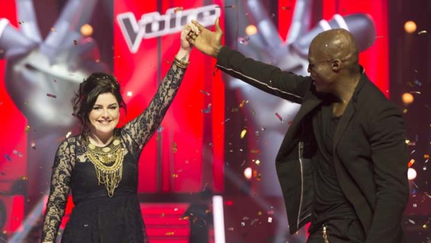 Seal of approval ... Karise Eden and her mentor, Seal, celebrate victory in last night's final of <em>The Voice</em>. The show has been a massive ratings hit for Channel Nine, which has already confirmed a second series.