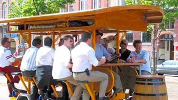 Tourists on a beer bike in Germany.