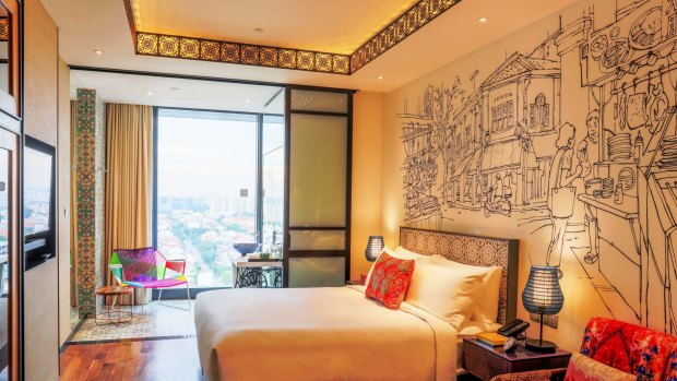 The vibrant guest rooms at Hotel Indigo Singapore Katong mirror a condensed Peranakan home.