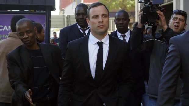 Oscar PIstorius leaves court in Pretoria.