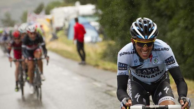 Alberto Contador attacks on the final climb of stage 16 of the Tour de France.
