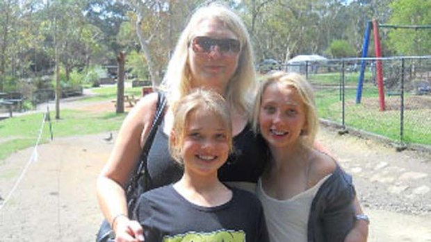 Janet Griffin with her daughters Emma, 12 and Darcy, 14.